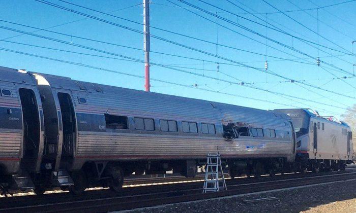 Amtrak Train Crashes Near Philadelphia, Lead Engine Derails