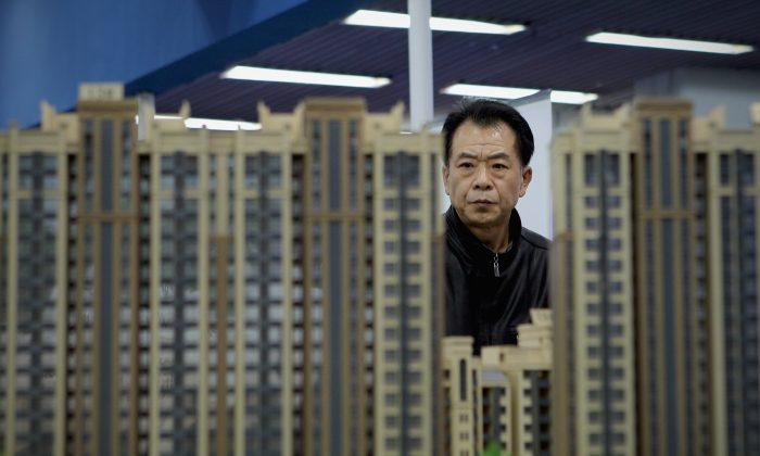 How China’s Real Estate Market Threatens Its Real Economy