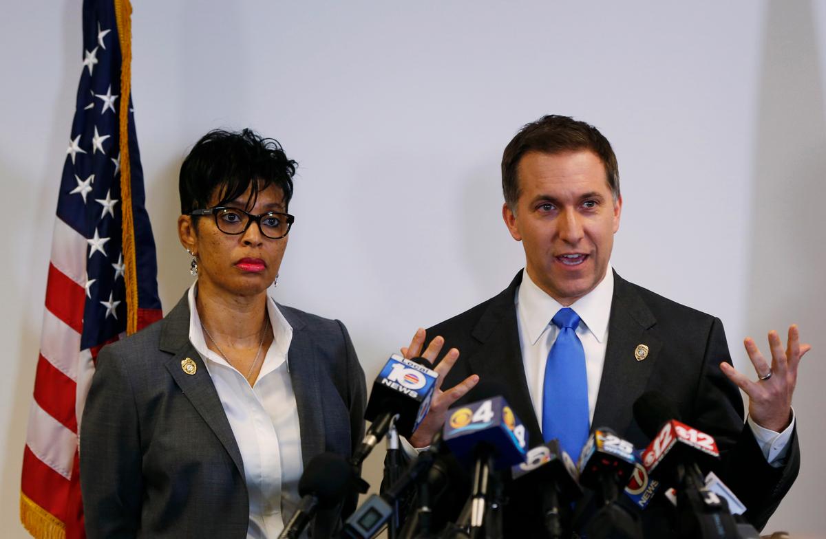 Palm Beach County, Fla., state attorney Dave Aronberg (R)—with assistant state attorney Adrienne Ellis (L)—speaks during a news conference in West Palm Beach, Fla., on April 14, 2016. (Wilfredo Lee/AP Photo)