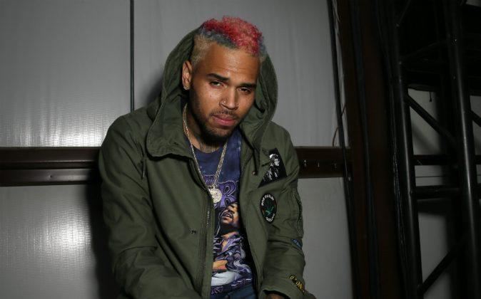 Latest: Chris Brown Comes Out of His Home