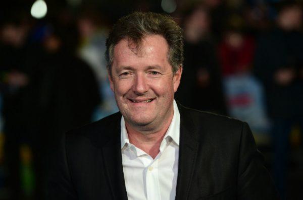 British journalist and television personality Piers Morgan poses for a photograph as he arrives for the European premiere of Eddie The Eagle in London on March 17, 2016. (Leon Neal/AFP/Getty Images)