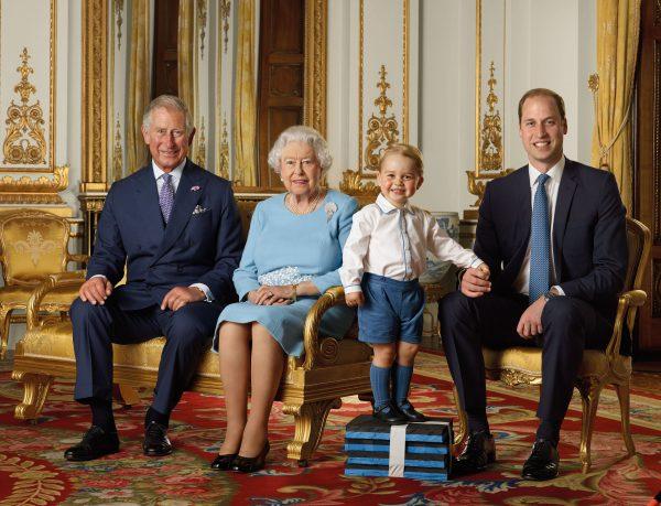  (L-R) Prince Charles, Prince of Wales, Queen Elizabeth II, Prince George, and Prince William, Duke of Cambridge pose during a Royal Mail photoshoot for a stamp sheet to mark the 90th birthday of Queen Elizabeth II in the White Drawing Room at Buckingham Palace in London, England, in the summer of 2015. (Ranald Mackechnie/Royal Mail/Getty Images)