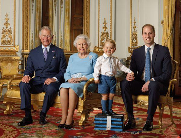 (L-R) Prince Charles, Prince of Wales, Queen Elizabeth II, Prince George, and Prince William, Duke of Cambridge pose during a Royal Mail photoshoot for a stamp sheet to mark the 90th birthday of Queen Elizabeth II in the White Drawing Room at Buckingham Palace in London, England, in the summer of 2015. (Ranald Mackechnie/Royal Mail/Getty Images)