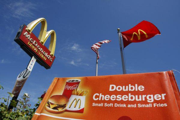 A Double Cheeseburger, Small Soft Drink, and Small Fries meal is advertised at a McDonald's restaurant in San Jose, Calif., on July 22, 2009. (AP Photo/Marcio Jose Sanchez)