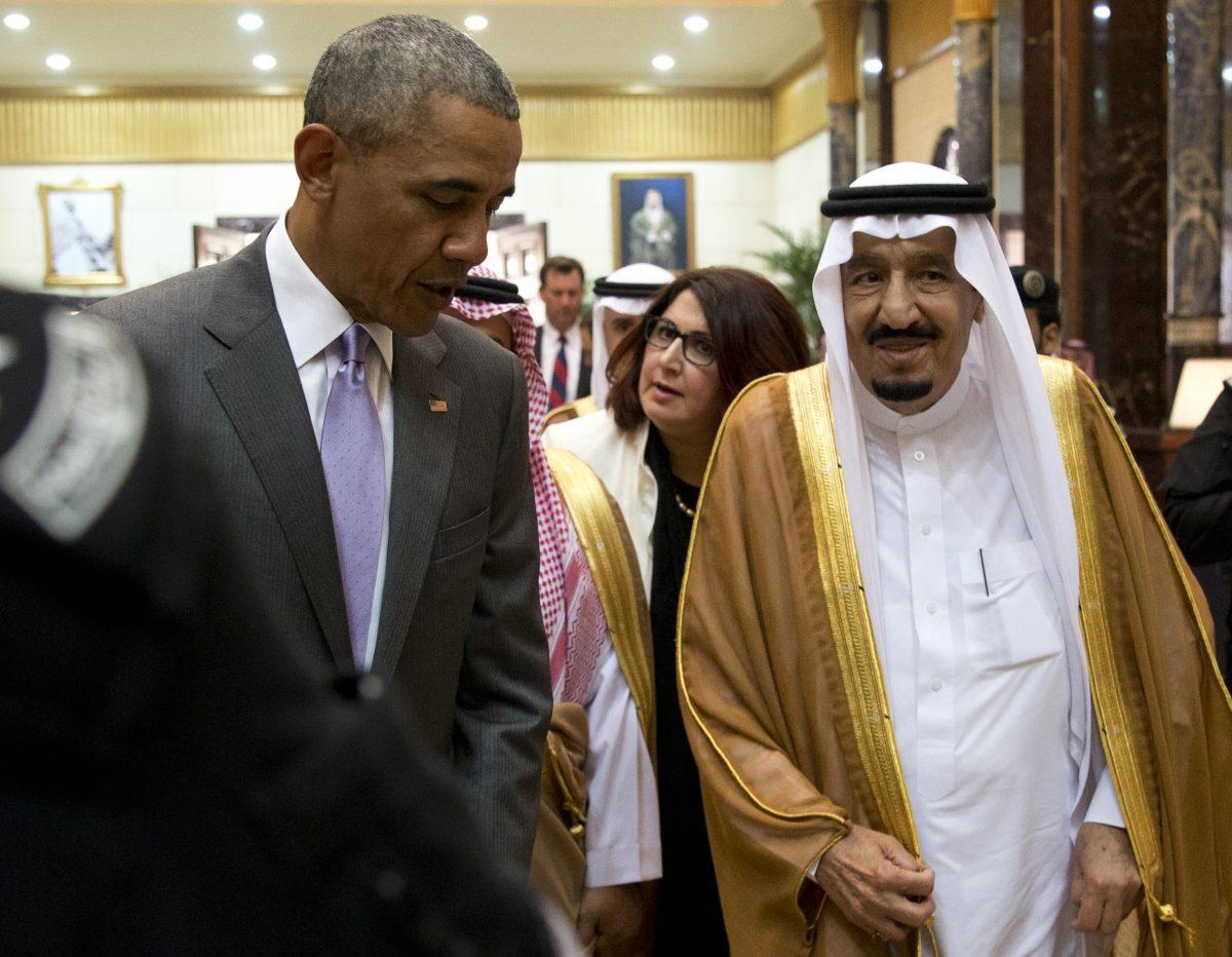 President Barack Obama and Saudi Arabia's King Salman walk together to a meeting at Erga Palace in Riyadh, Saudi Arabia, Wednesday, April 20, 2016. (Carolyn Kaster/AP Photo)
