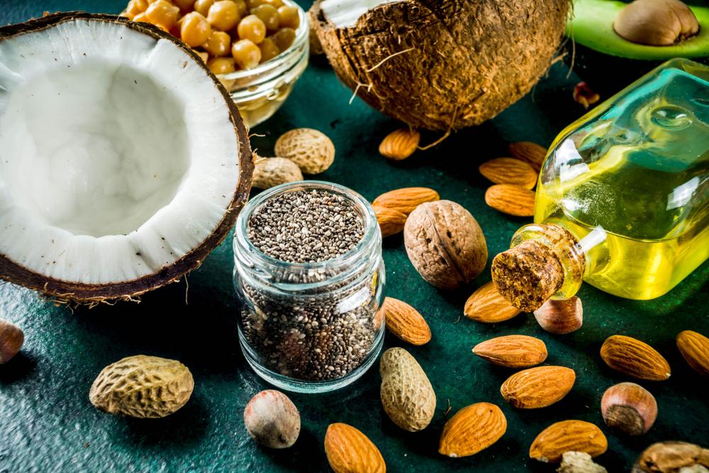 Healthy fat sources such as coconut, avocados, olive oil, and sprouted nuts and seeds must take a central role in the diet to promote healthy brain function. (Rimma Bondarenko/Shutterstock)