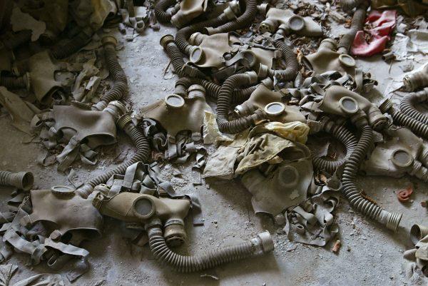 Abandoned gas masks lay on the floor of a classroom in a school on 26 May 2003 of the deserted town of Prypyat, adjacent to the Chernobyl nuclear site. (Sergei Supinsky/AFP/Getty Images)