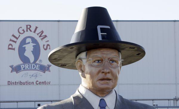 A statue of Pilgrim's Pride founder Bo Pilgrim is displayed outside the company's distribution center near Pittsburg, Texas on Dec. 2, 2008. Brazilian beef producer JBS SA said it would buy a majority stake in Pilgrim's Pride for $800 million. (LM Otero/AP Photo, file)