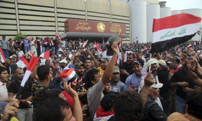 Iraqi Protesters Pour Into Green Zone, Storm Parliament
