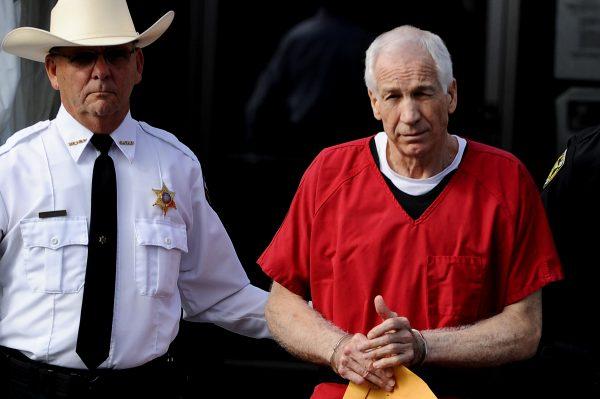 Former Penn State assistant football coach Jerry Sandusky was sentenced to at least 30 years and not more that 60 years in prison for his conviction in June on 45 counts of child sexual abuse. (Patrick Smith/Getty Images)