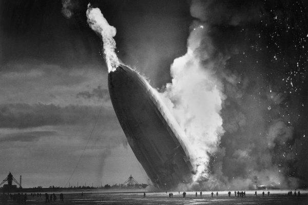 The German dirigible Hindenburg crashes to earth, tail first, in flaming ruins after exploding at the U.S. Naval Station in Lakehurst, N.J., on May 6, 1937. The disaster, which killed 36 people after a 60-hour transatlantic flight from Germany, ended regular passenger service by lighter-than-air airships. (AP Photo/Murray Becker)