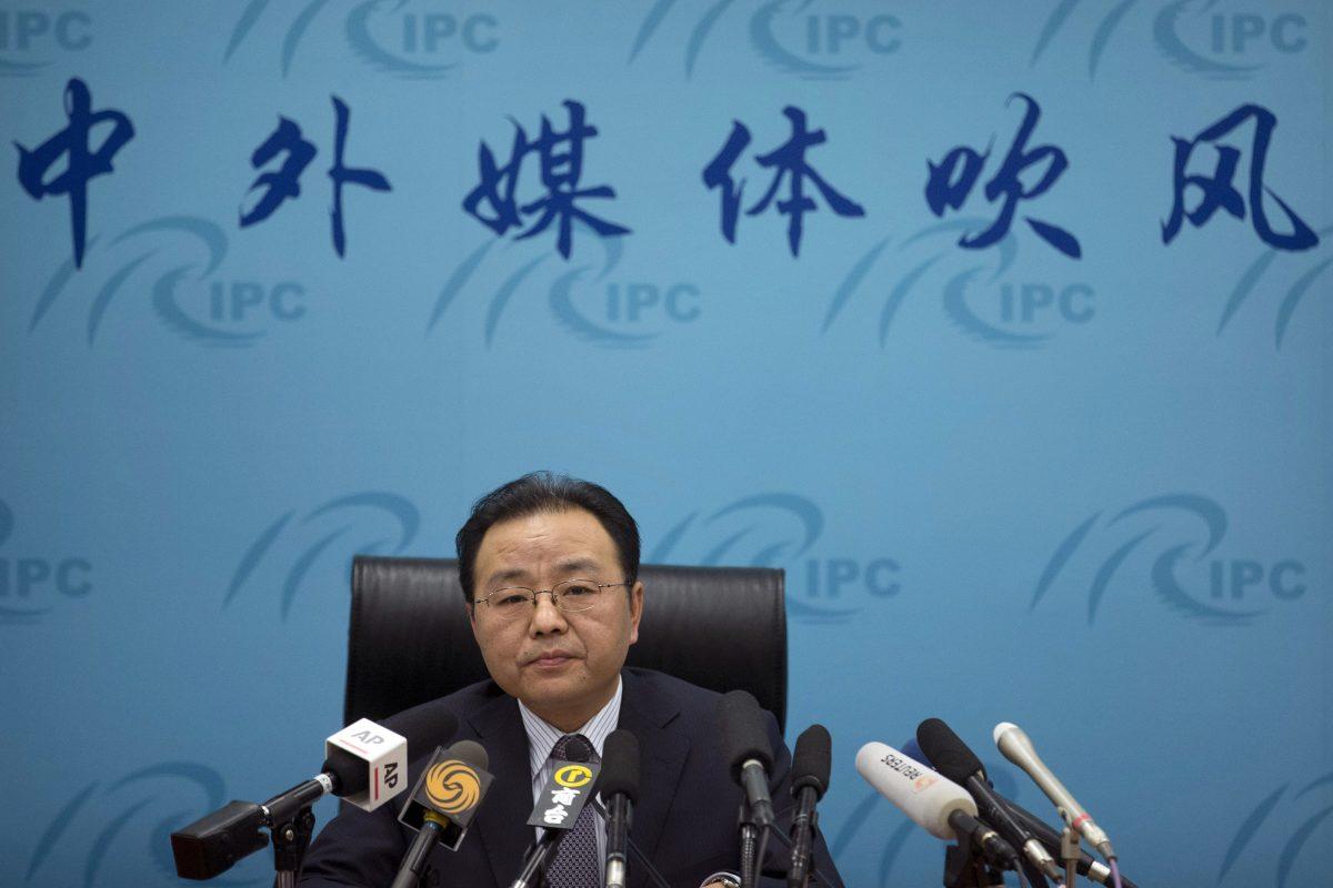 Ouyang Yujing, director-general of the Department of Boundary and Ocean Affairs of China's Ministry of Foreign Affairs, speaks during a press briefing about China's South China Sea policies in Beijing on May 6, 2016. (Mark Schiefelbein/AP Photo)