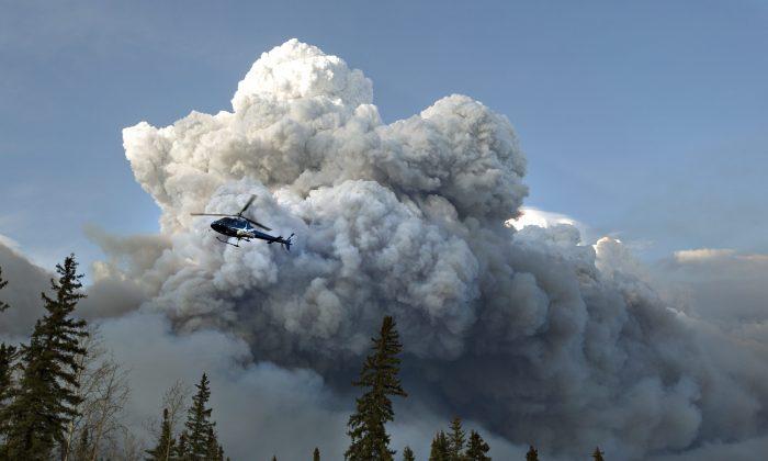 Canada Evacuating 8,000 Wildfire Evacuees by Air