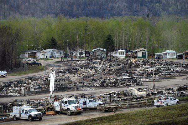 Ptarmigan Court Trailer Park is viewed during a media tour of the fire-damaged city of Fort McMurray, Alberta, Monday, May 9, 2016. A break in the weather has officials optimistic they have reached a turning point on getting a handle on the massive wildfire. (Jonathan Hayward/The Canadian Press via AP)