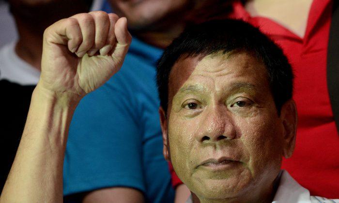 New Philippine Leader Seen as Emancipator, Looming Dictator