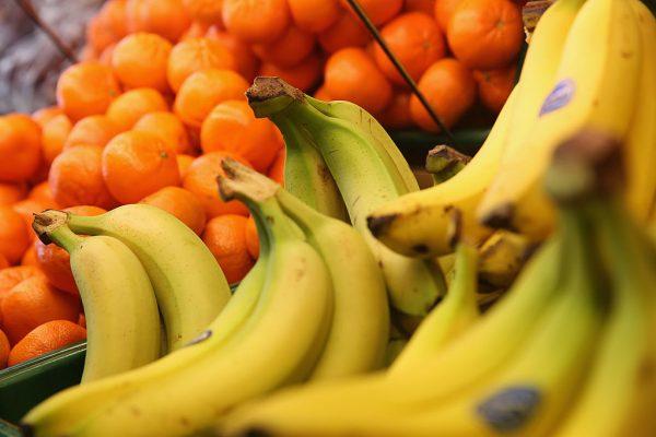 Oranges and bananas are displayed for sale at a shop in Northwich, United Kingdom, on April 1, 2014. (Christopher Furlong/Getty Images)