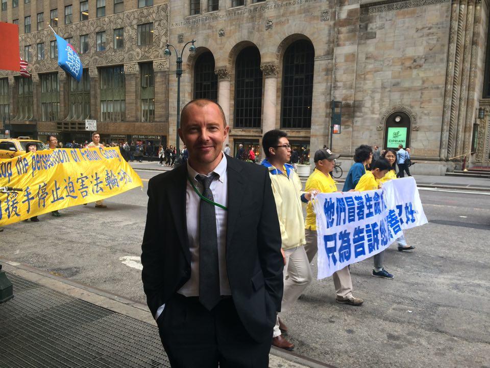 Mark Aynsley, a school teacher in Japan, was a spectator at the World Falun Dafa Day parade on May 13, 2016. (Juliet Song/Epoch Times)