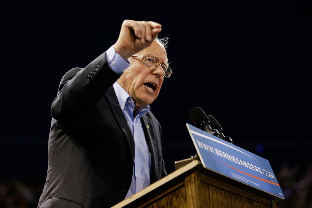 Sanders says he will work with Clinton to transform party