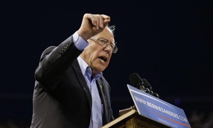 Sanders says he will work with Clinton to transform party