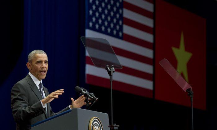 Obama Pushes for Better Rights in Vietnam After Arms Deal