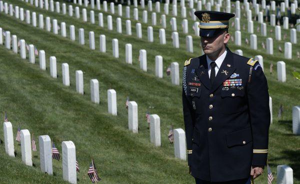 A member of the honor guard stands during Memorial Day ceremony at Arlington National Cemetery in Arlington, Va., on May 25, 2015. (Olivier Douliery/Getty Images)
