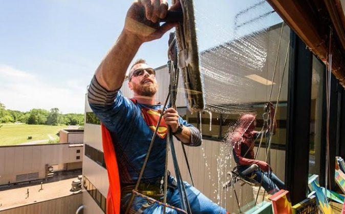 Window Washers Dress up as Superheroes to Clean Windows of Children’s Hospital