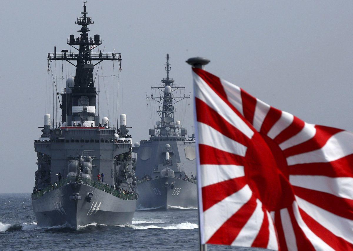 Japanese Maritime Self-Defense Force ships sail in formation during naval exercises off Sagami Bay, Japan, on Oct. 22, 2006. (Koichi Kamoshida/Getty Images)