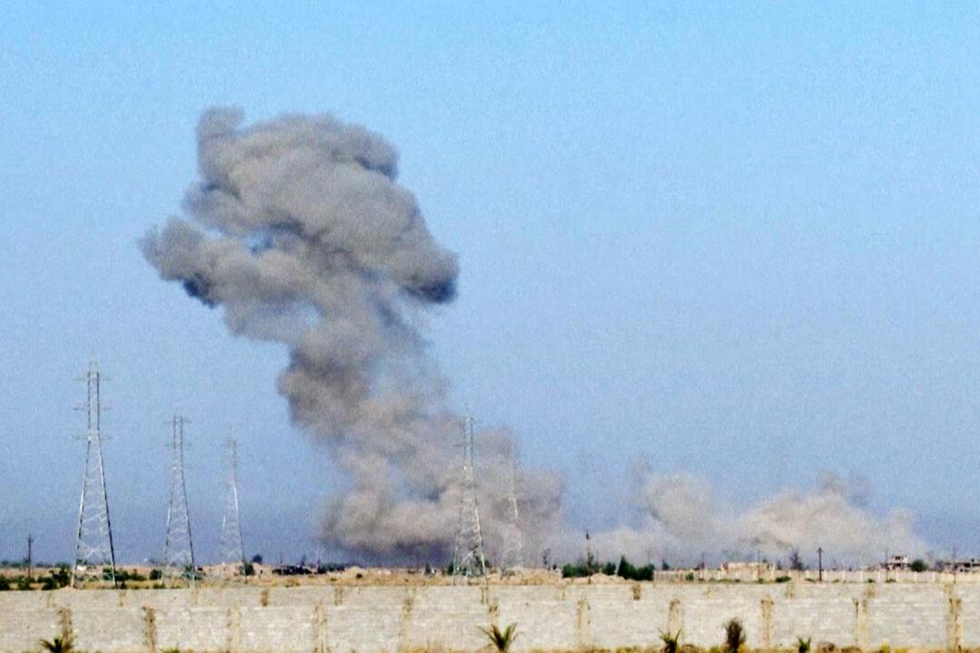 IS Bombings in Baghdad, Near Iraqi Capital Kill at Least 24