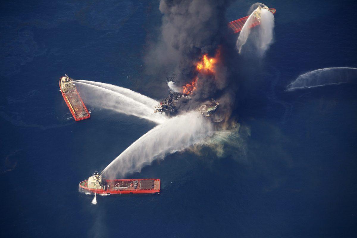 The Deepwater Horizon oil rig burns in the Gulf of Mexico following an explosion that killed 11 workers and caused the worst offshore oil spill in the nation's history on April 21, 2010. (AP Photo/Gerald Herbert, File)