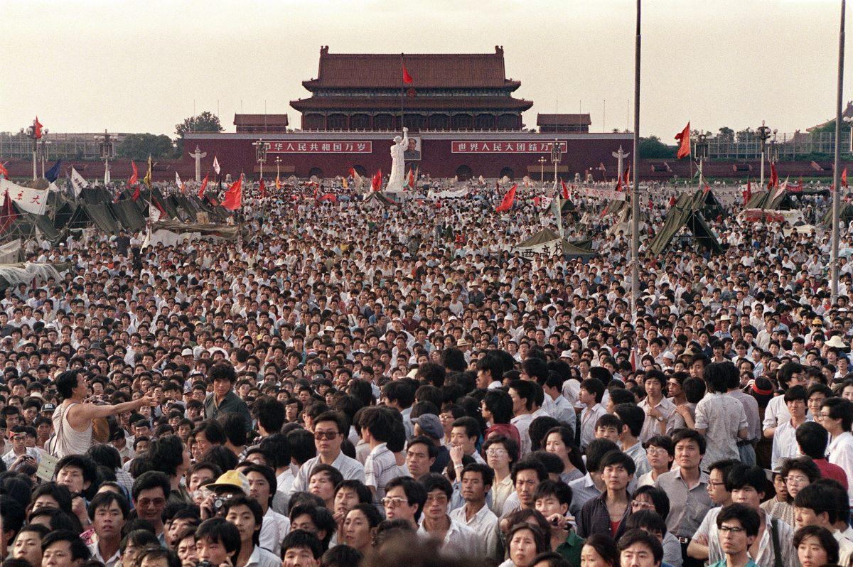 Hundreds of thousands of protesters gather around a 33-feet statue called the Goddess of Democracy on Tiananmen Square demanding democracy in Beijing on June 2, 1989. (Catherine Henriette/AFP/Getty Images)