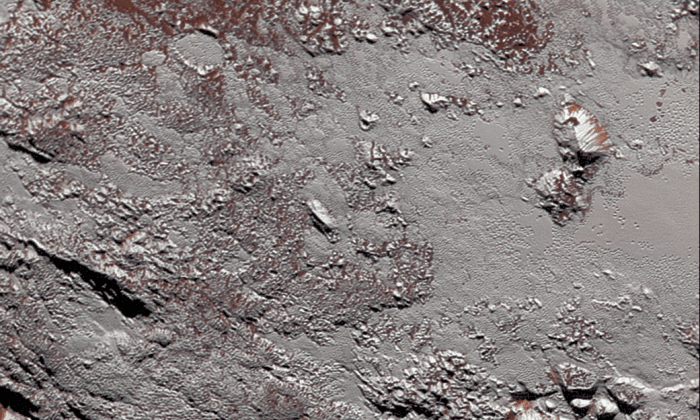 Photos: Never Before Seen Closeup of Pluto’s Surface Captured by Spacecraft