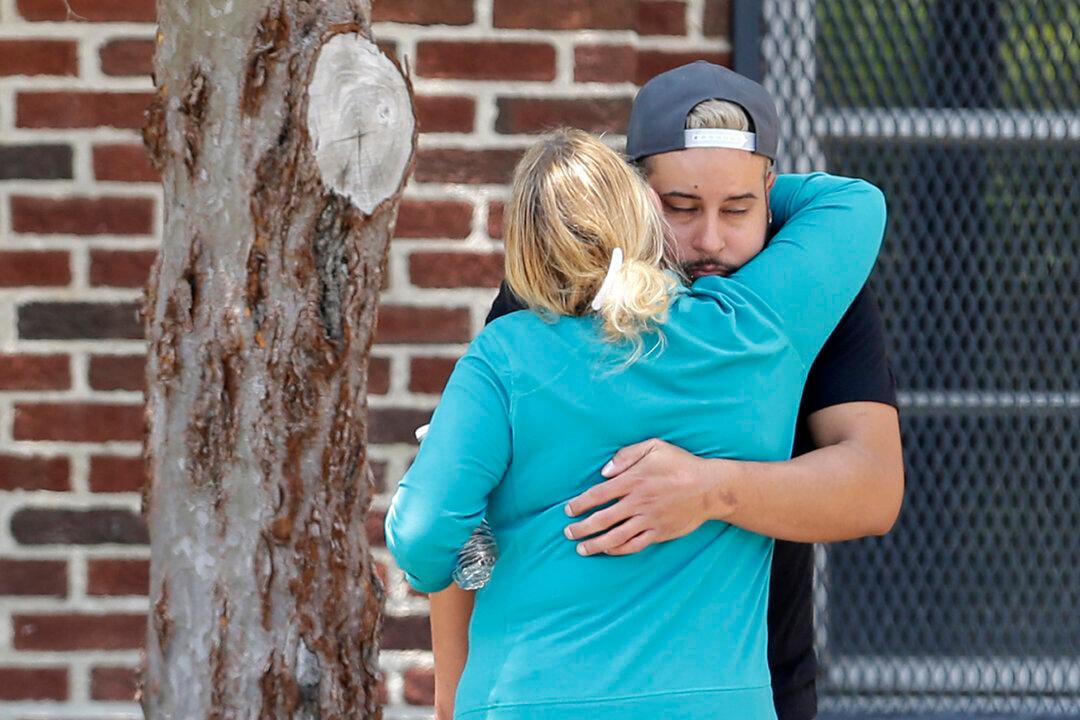 Orlando Mourns as Possible Motives Emerge for Club Gunman