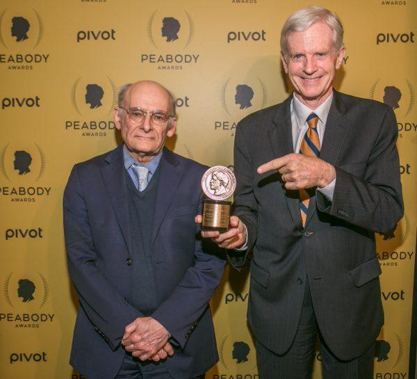 David Matas (L) and David Kilgour, who were both featured in the film "Human Harvest: China's Illegal Organ Trade," hold the Peabody Award it won at the 74th Annual Peabody Awards in New York on May 31, 2015. (Benjamin Chasteen/Epoch Times)