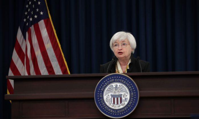 ‘Scared’ Fed Slashes Interest Rate Outlook