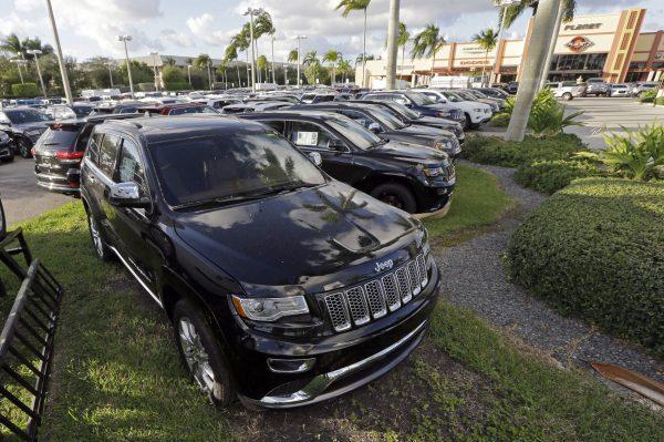 2015 Grand Cherokees on display at a Fiat Chrysler dealership in Doral, Fla., Nov. 5, 2015. (Alan Diaz/AP Photo)