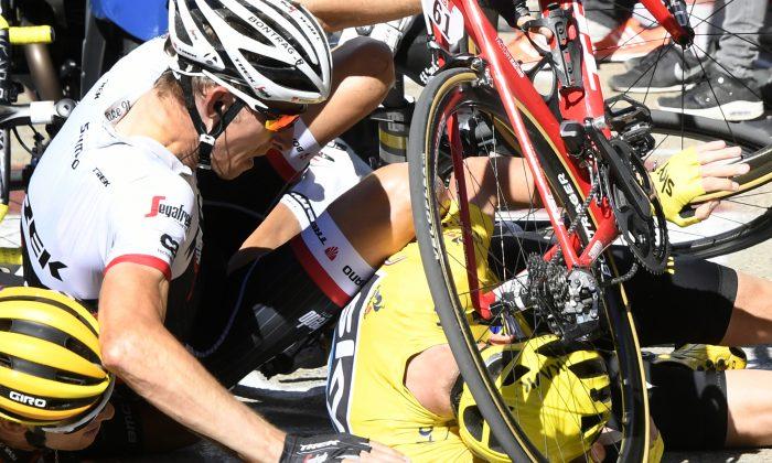 Climbing Catastrophe: Chris Froome Brought Down by Motorcycle Collision in Tour de France Stage 12