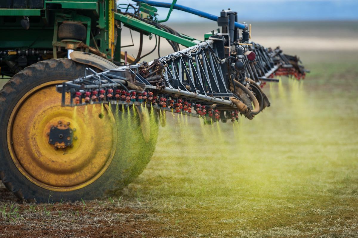 Herbicide is sprayed on a soybean field in the Cerrado plains near Campo Verde, Mato Grosso state, western Brazil on Jan. 30, 2011. (Yasuyoshi Chiba/AFP/Getty Images)