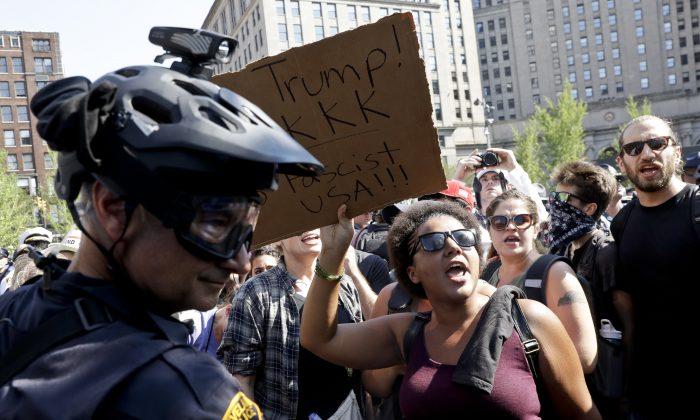 Police Break Up Skirmishes Among Demonstrators in Cleveland