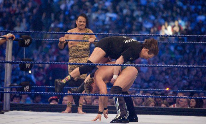 Dozens of Wrestlers Sue WWE Over Neurological Injuries