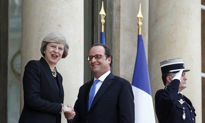 British PM Reassures France on Defense Ties After EU Exit