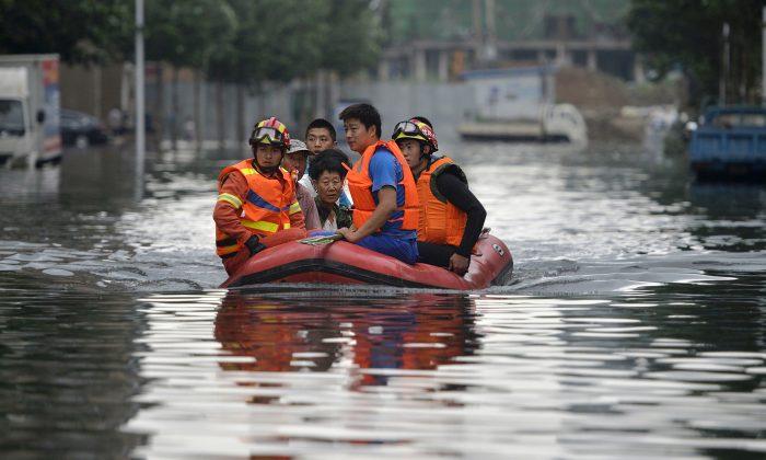 Floods Kill at Least 154 Across China, Leave Scores Missing