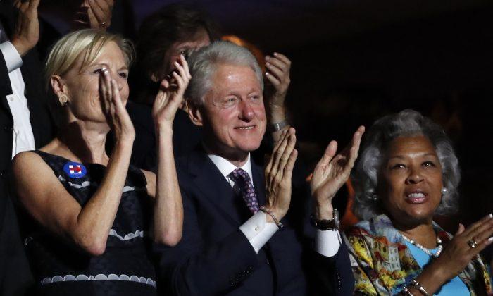 In 10th Convention Speech, Bill Clinton Faces Tougher Crowd
