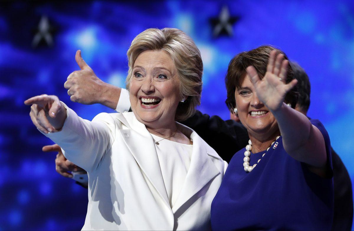 Democrat presidential nominee Hillary Clinton (L) is joined by Anne Holton, wife of Democrat vice presidential candidate Sen. Tim Kaine (D-Va.), during the final day of the Democratic National Convention in Philadelphia on July 28, 2016. (Carolyn Kaster/AP Photo)