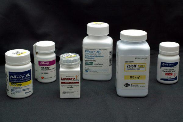 Bottles of antidepressant pills, (L-R) Wellbutrin, Paxil, Lexapro, Effexor, Zoloft, and Fluoxetine, photographed in Miami, Fla., on March 23, 2004. (Joe Raedle/Getty Images)