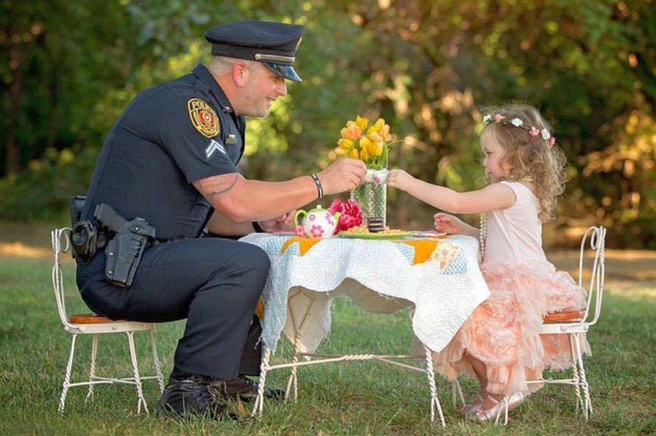 Texas Police Officer Has Tea With Little Girl He Saved