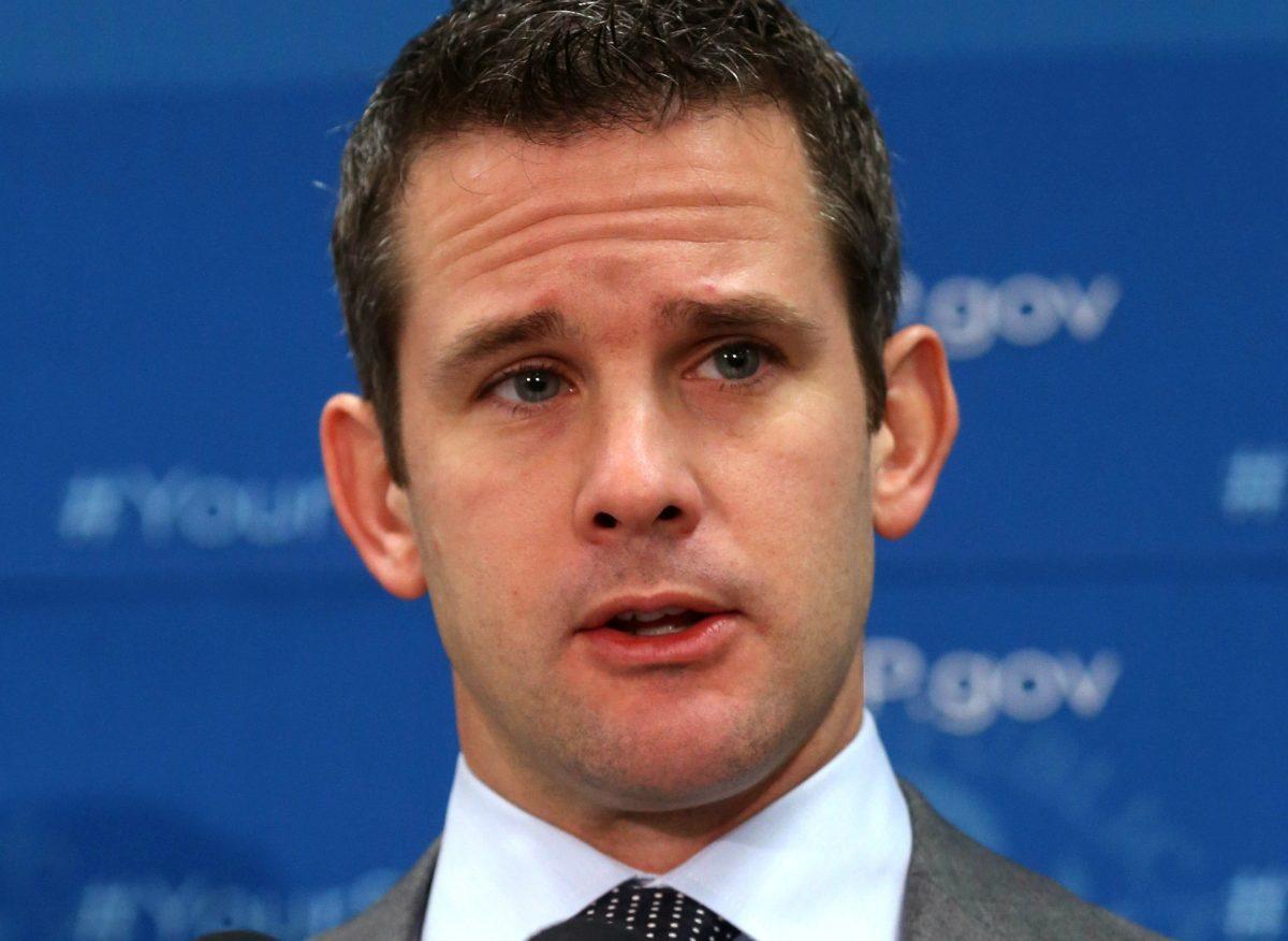 Rep. Adam Kinzinger (R-Ill.) speaks to the media after attending the weekly House Republican conference at the U.S. Capitol in Washington on Oct. 29, 2013. (Mark Wilson/Getty Images)