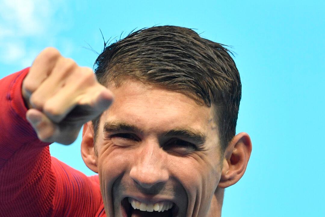 Why Michael Phelps Was Laughing During the National Anthem