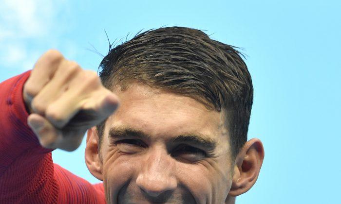 Why Michael Phelps Was Laughing During the National Anthem