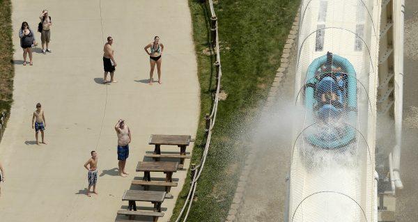 Riders are propelled by jets of water as they go over a hump while riding a water slide called "Verruckt" at Schlitterbahn Waterpark in Kansas City, Kan, in this file photo. (Charlie Riedel/AP)