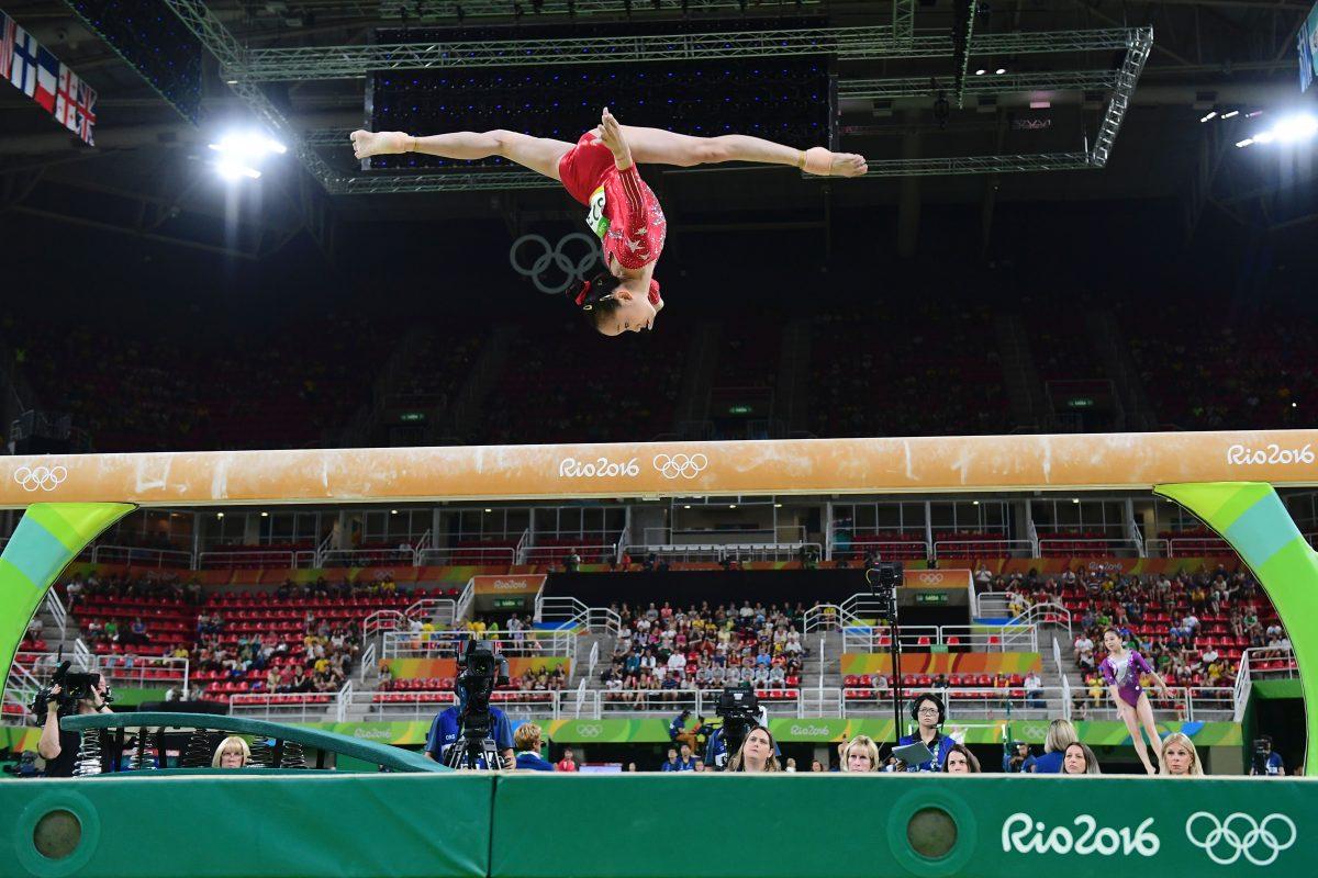 China's Fan Yilin competes in the qualifying for the women's Beam event of the Artistic Gymnastics at the Olympic Arena during the 2016 Olympic Games in Rio de Janeiro on Aug. 7, 2016. (Emmanuel Dunand/AFP/Getty Images)